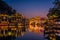 Illuminated historic arched bridge in Feng Huang