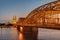 The illuminated Hohenzollern Bridge with the famous Cologne Cathedral