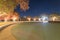 Illuminated holiday lightings at public park with basketball court in Texas, America