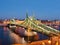 Illuminated Liberty Bridge and River Danube at night. Budapest, Hungary