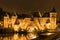 Illuminated medieval gateway Koppelpoort at night, Amersfoort the Netherlands