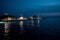 Illuminated Motorboats At Jetty In Calm Harbor In Croatia