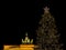 Illuminated Neoclassical Brandenburg Gate Brandenburger Tor and Christmas Tree in the year 2019 as viewed from the Pariser Platz