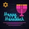 Illuminated neon signs Happy Hanukkah holiday light electric banner glowing on black brickwall.