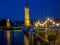 Illuminated New Lindauer Lighthouse at the harbor of Lindau at lake Bodensee in Germany