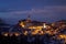 Illuminated old town with castle