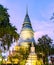 The illuminated pagoda of Wat Phnom Daun Penh Buddhist temple at sunset,Phnom Penh,Cambodia