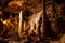 Illuminated picturesque karst rock formations in Balcarka Cave, Moravian Karst, Czech: Moravsky Kras, Czech Republic