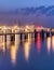 Illuminated pier in river Scheldt with container terminal, Port of Antwerp, Belgium