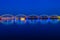 Illuminated railway bridge at twilight. Riga, Latvia