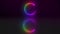 Illuminated rainbow neon lights in a circle shape or pattern against a dark background in studio. CGI circular art