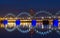 Illuminated Riga Railway bridge over river Daugava at night