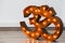 Illuminated rustic marquee floor lamp in the shape of OM symbol as a yoga studio decoration