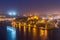 Illuminated skyline of Senglea and Three Cities from Grand Harbor in Malta