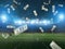 Illuminated soccer stadium and falling banknotes of bettors