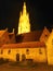 Illuminated spire of historic cathedral