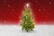 Illuminated star on a christmas tree
