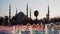 Illuminated Sultan Ahmed Mosque Blue Mosque before sunrise, View of the evening fountain. Istanbul, Turkey