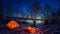 Illuminated tent in the winter camp by the lake at night