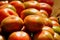 Illuminated tomatoes on the market bench