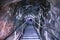 Illuminated underground entrance of Turda salt mine, Cluj