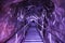 Illuminated underground entrance of Turda salt mine, Romania