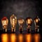 Illuminated vintage Edison bulbs in a dark environment