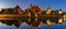 Illuminated walls of the Malbork Castle at night