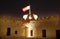 Illuminated western tower of Riffa fort, Bahrain