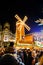 An illuminated windmill looks over the stalls at the German Christmas market in Birmingham