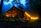 Illuminated yellow camping bell tent at night. Glamping bell tent glows at forest