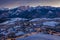 Illuminated Zakopane city in winter after dusk, aerial view