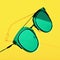 Illuminating colored retro styled mint sunglasses.