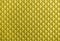 Illuminating Pantone color of the year 2021. Vintage background with small symmetrical yellow rhombus