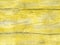 Illuminating yellow and gray wooden background