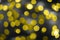 Illuminating yellow and Ultimate Gray background of blurred bokeh. Color 2021. Abstract background, close-up.