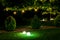 Illumination backyard light garden with electric ground sphere lantern.