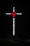 Illumination of a cross with red heart
