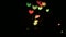 Illumination garland decoration blinking on heart shaped bokeh background.