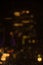 Illumination in the night city, blurred skyscraper, building. Background, bokeh, raindrops