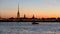 Illumination of Peter and Paul fortress against the backdrop of the setting sun