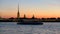 Illumination of Peter and Paul fortress against the backdrop of the setting sun