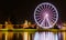 Illuminations in the Polish city of Szczecin, ferris wheel, port grider,  at night Europa