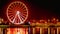 Illuminations in the Polish city of Szczecin, ferris wheel, port grider,  at night Europa