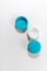 Illustrate a blue color contact lens case on a white background