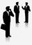 Illustrated silhouettes of businessmen.