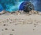 Illustration of a barren world with a planet rising in the background