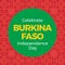 Illustration of celebrate burkina faso independence day text in green circle against red scribbles