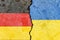 Illustration of the flags of Germany and Ukraine separated by a crack - conflict or comparison