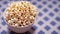 An Illustration Of A Masterfully Created Bowl Of Popcorn On A Table